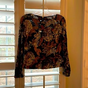 Beautiful high quality cocktail top.  Gold and silver appliqués.  Fully lined.